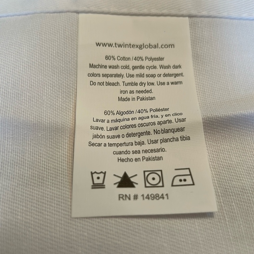 Eight white dinner napkins